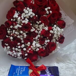 Beautiful red mixed roses with chocolate