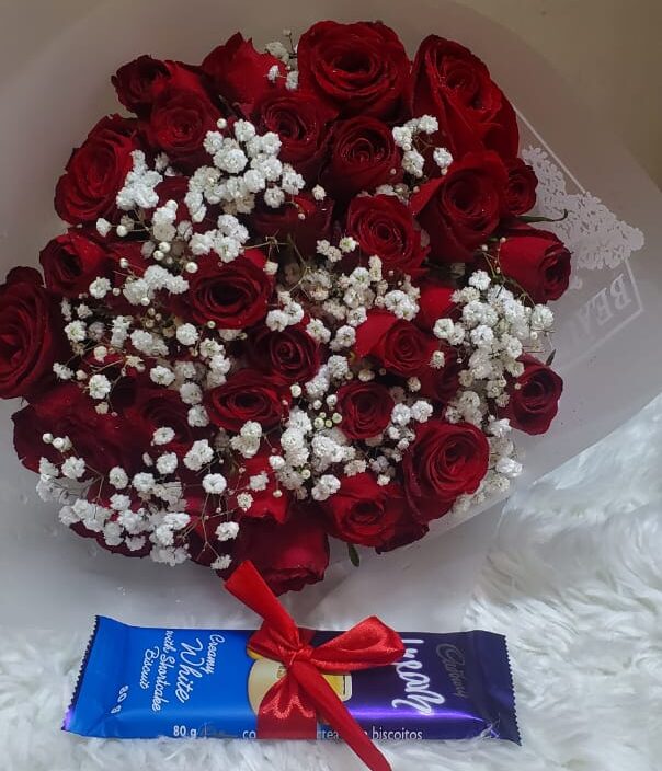 Beautiful red mixed roses with chocolate